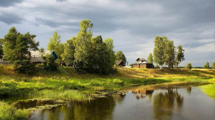 Amazing Scene Of Houses Near Small River